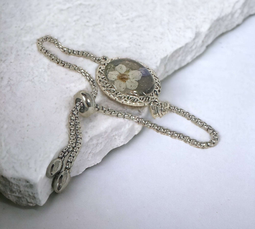 Silver Elegance: Handcrafted Resin Bracelet with Dried Flower Accents