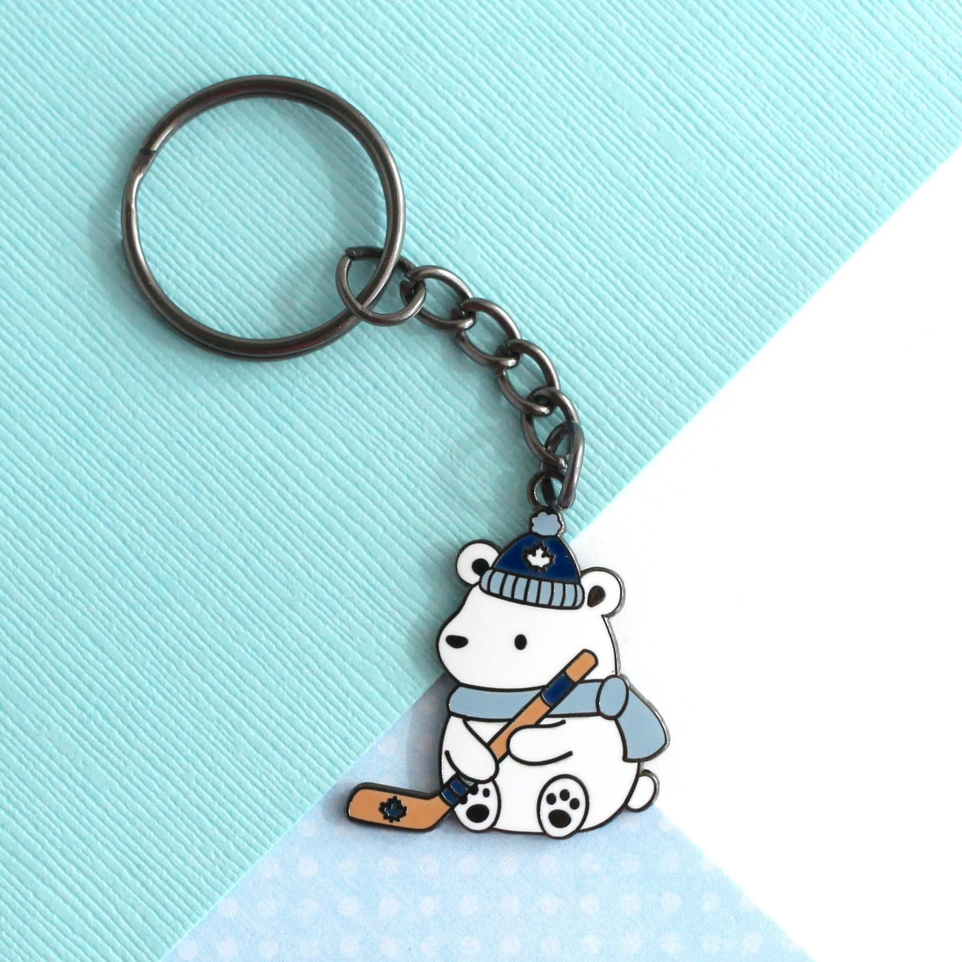 Polar Bear Playing Hockey Enamel Keychain