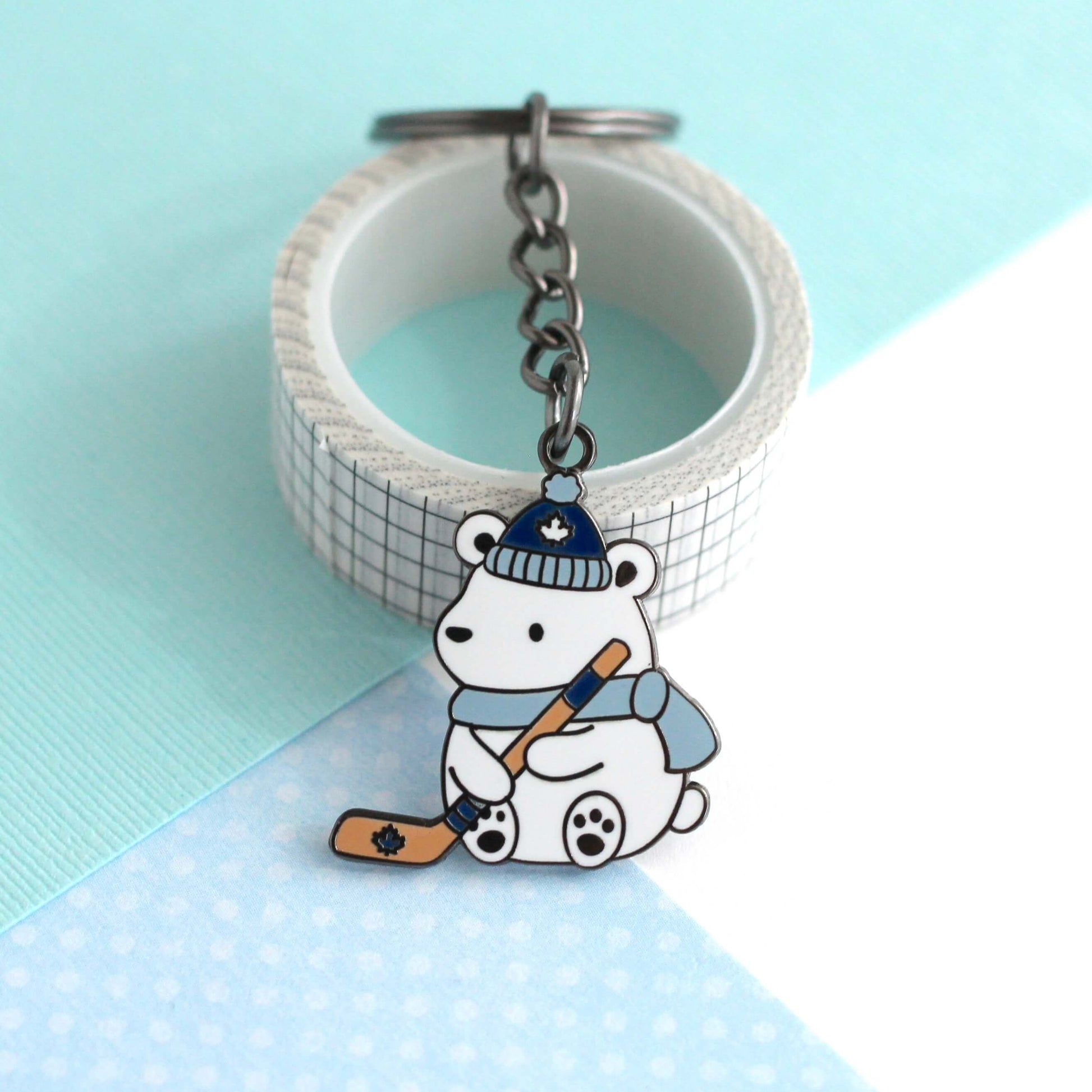 Polar Bear Playing Hockey Enamel Keychain