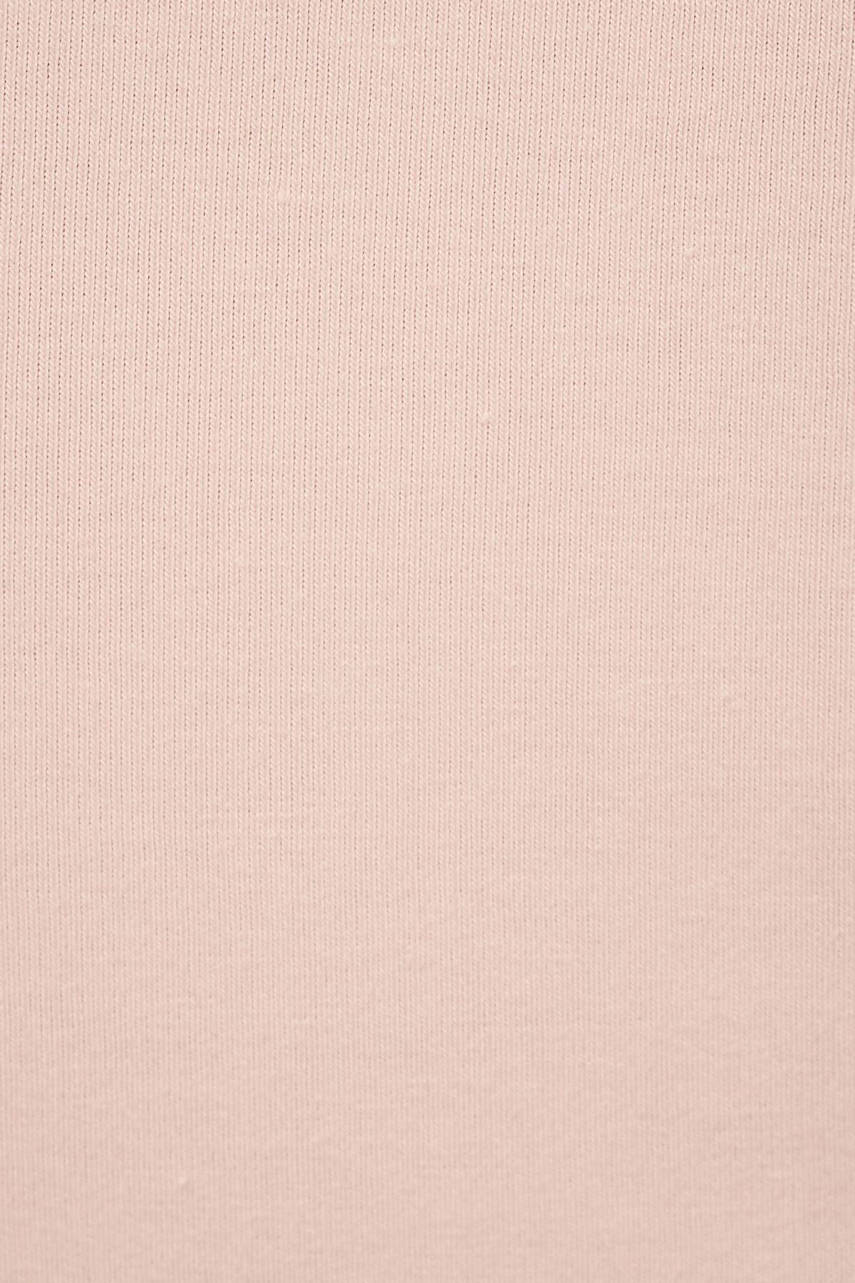 Haut court à manches longues et torsadé sur le devant