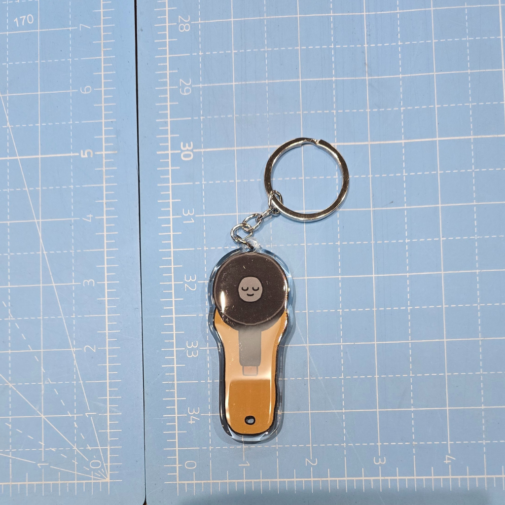 Porte-clés cutter rotatif