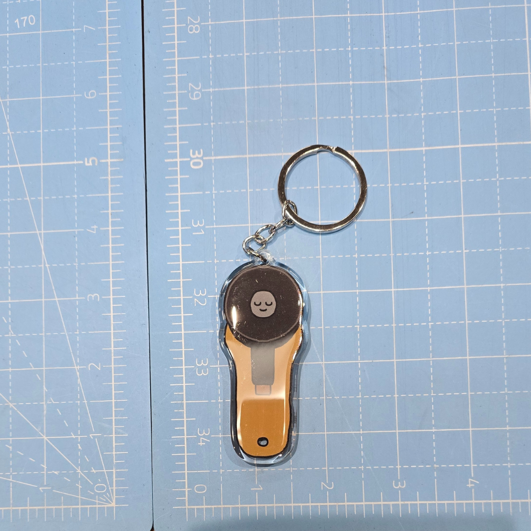 Porte-clés cutter rotatif