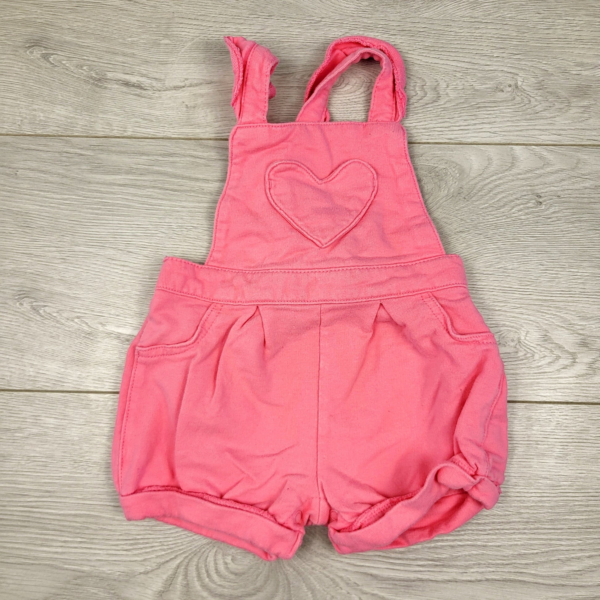 CAAC1 - Salopette Carters rose en coton avec poche cœur. Taille 6 mois