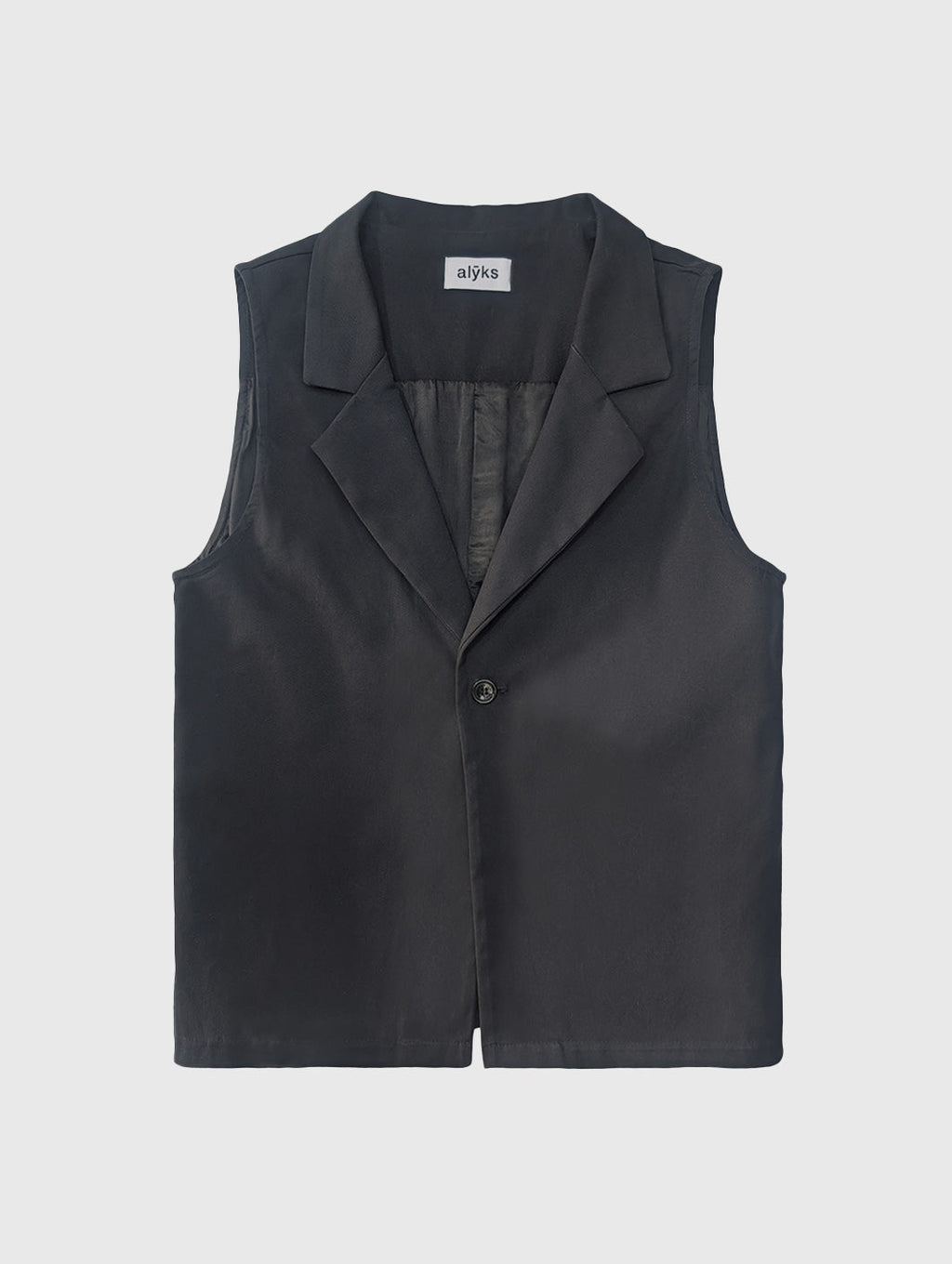 LA VESTE SANS MANCHES