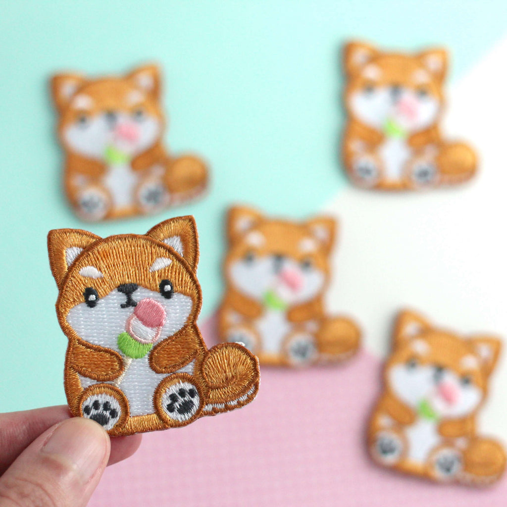 Shiba Inu holding Dango Embroidered Patch. Dog Iron-On Patch
