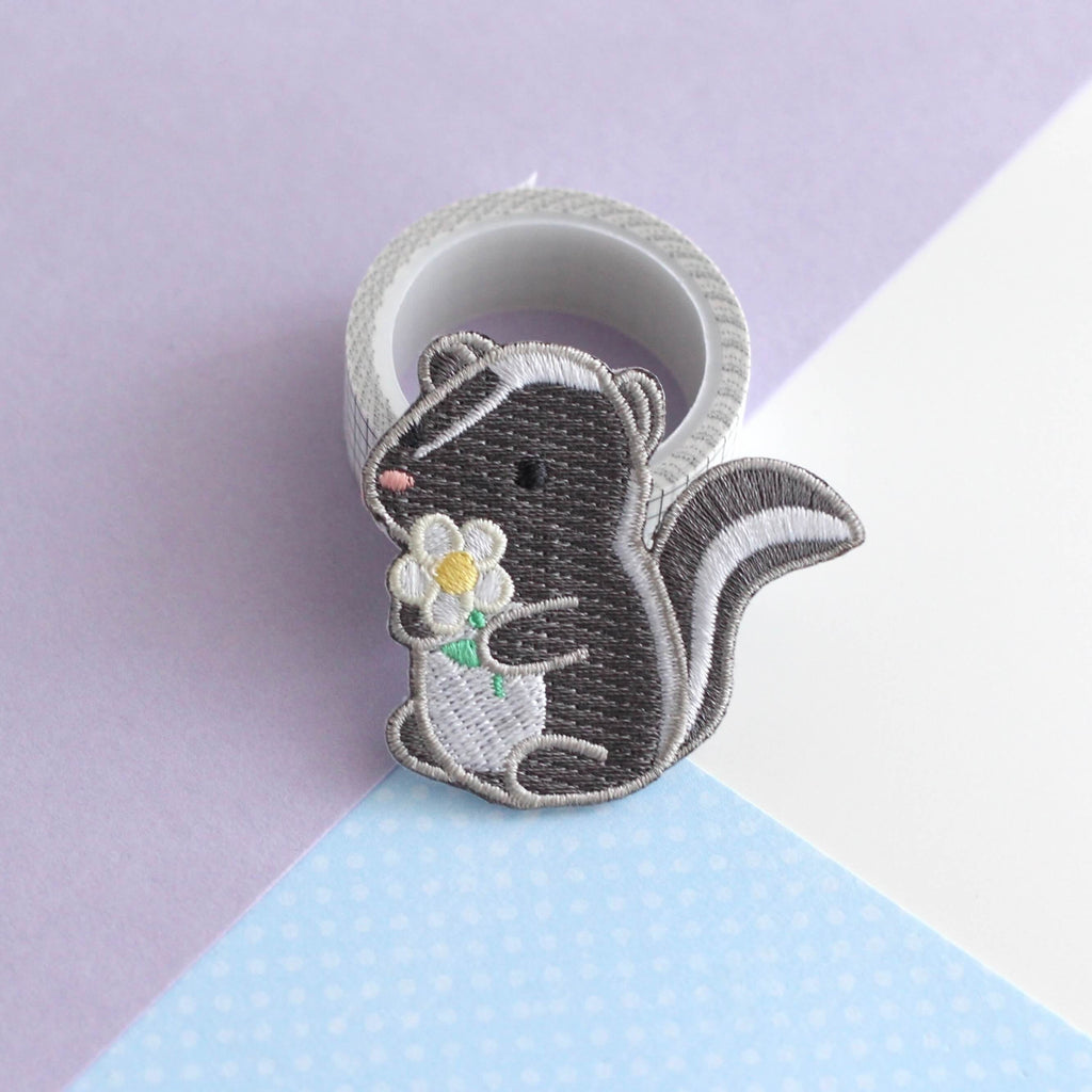 Skunk and Daisy Embroidered Iron-On Patch
