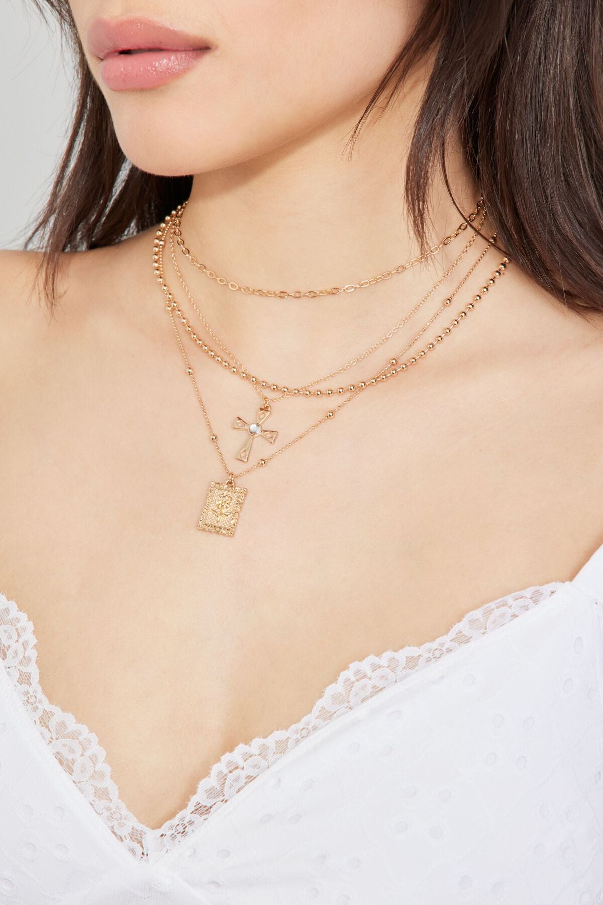 Ensemble de 4 colliers avec pendentif croix et rose