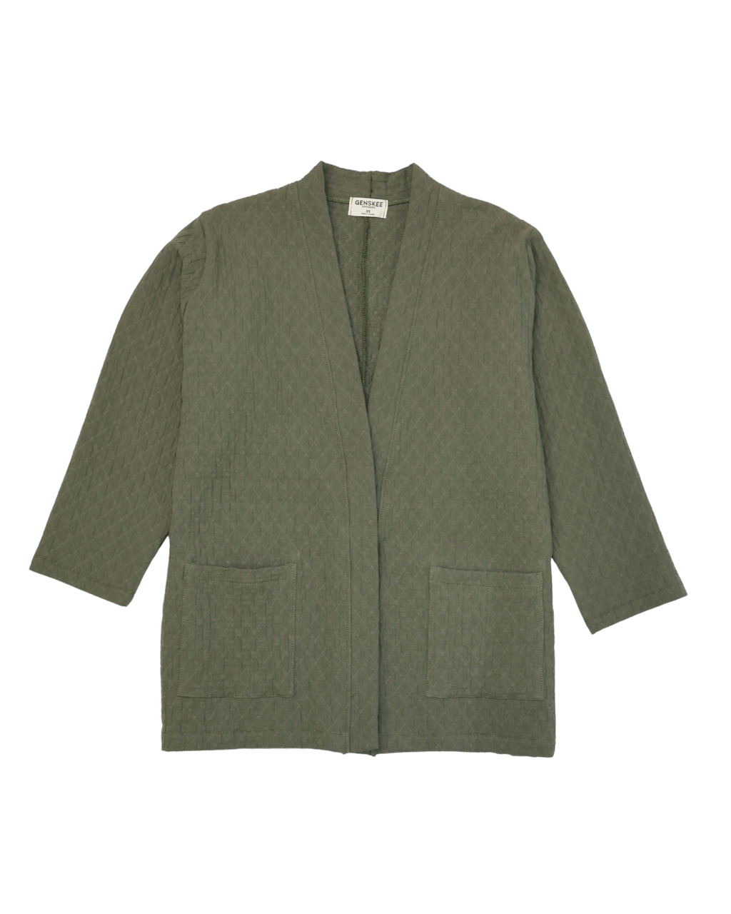 Le cardigan matelassé en coton biologique vert