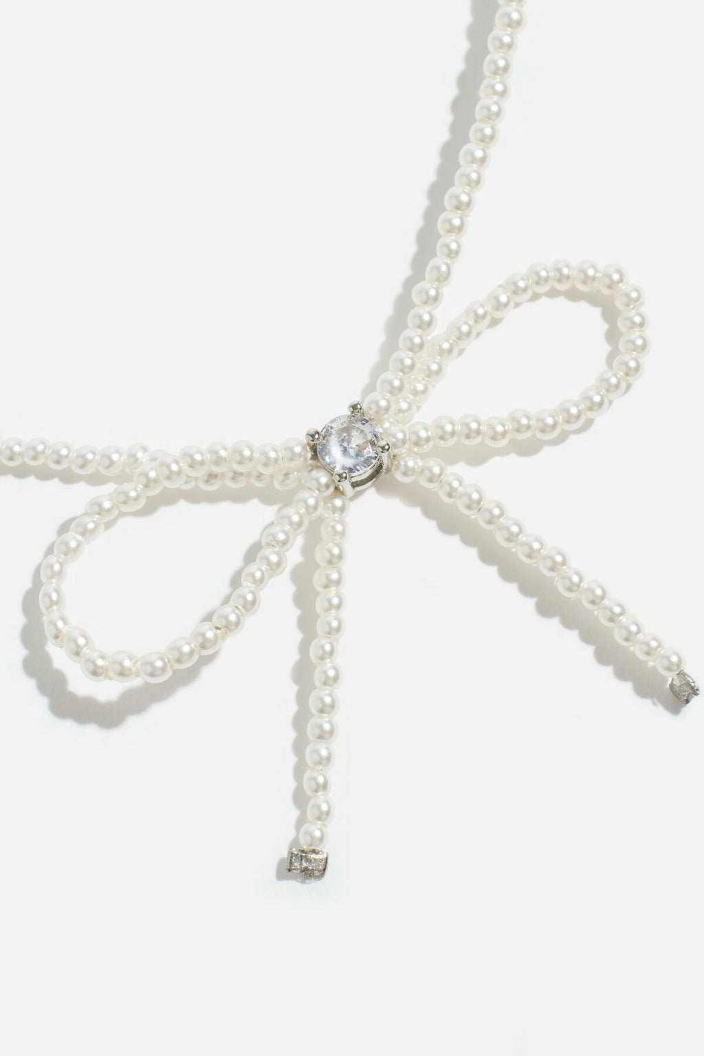 Collier de perles en forme de nœud