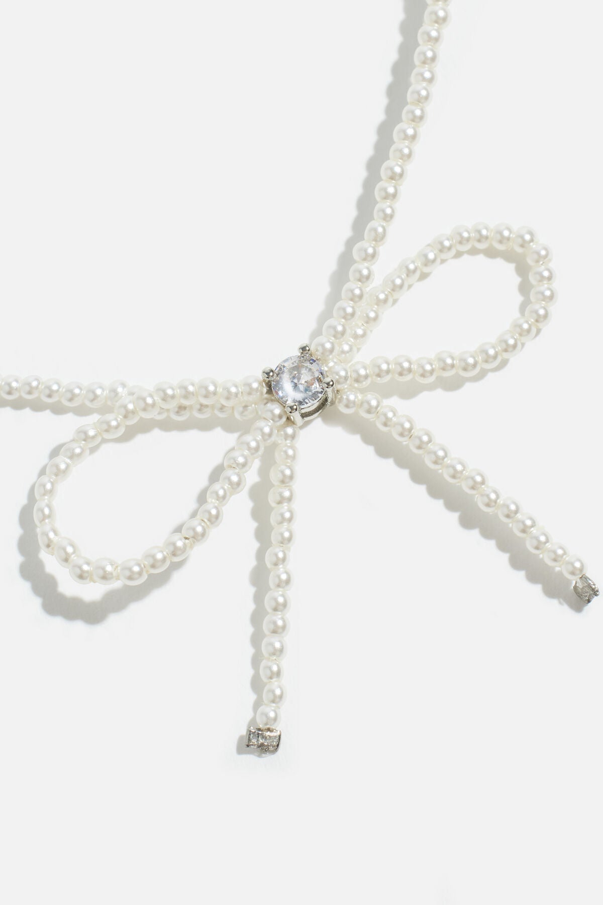 Collier de perles en forme de nœud