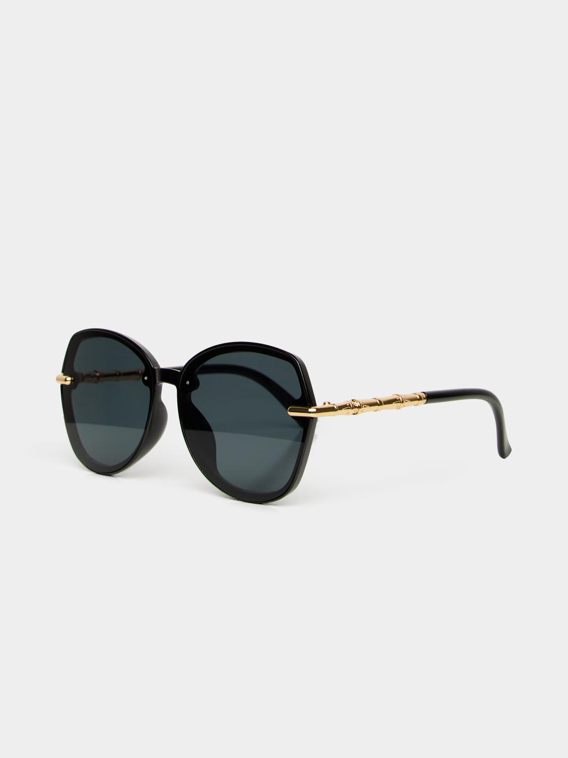 Lunettes de soleil rondes à monture transparente