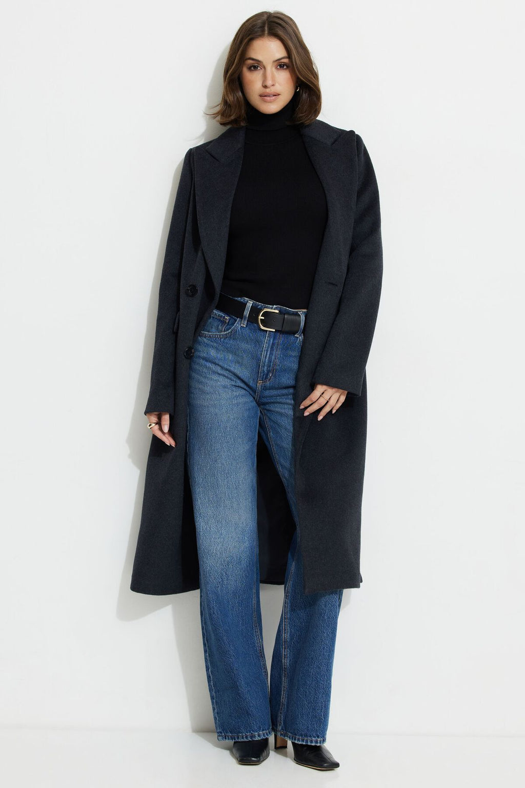 Pull à col roulé et poignets boutonnés