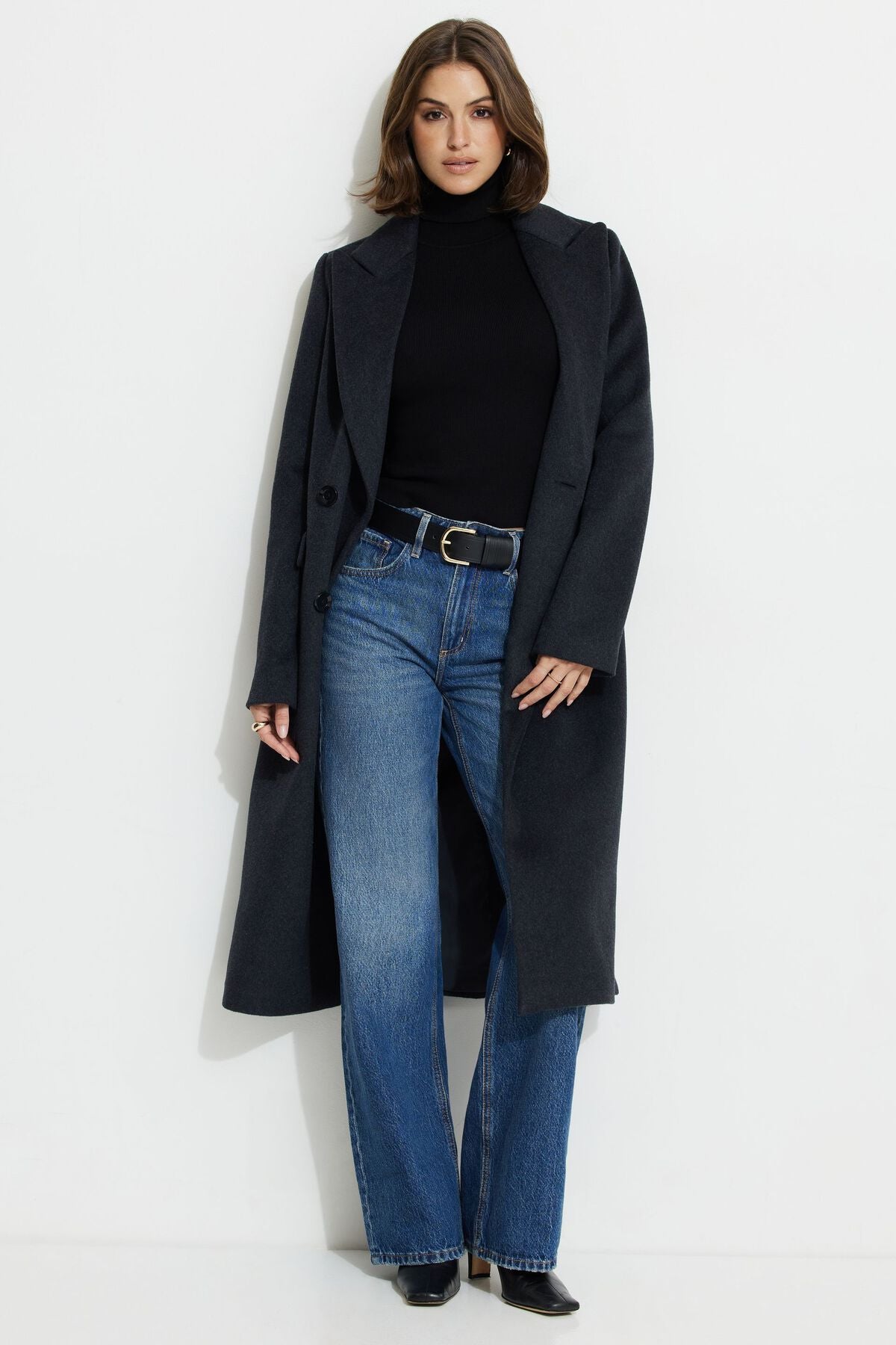 Pull à col roulé et poignets boutonnés