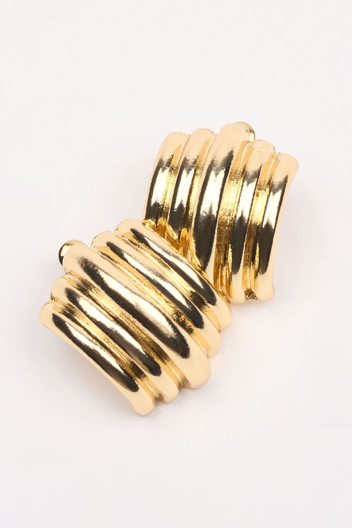 Boucles d'oreilles à boutons courbés doublés