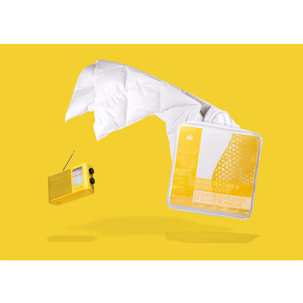Couette en plumes et duvet blanc