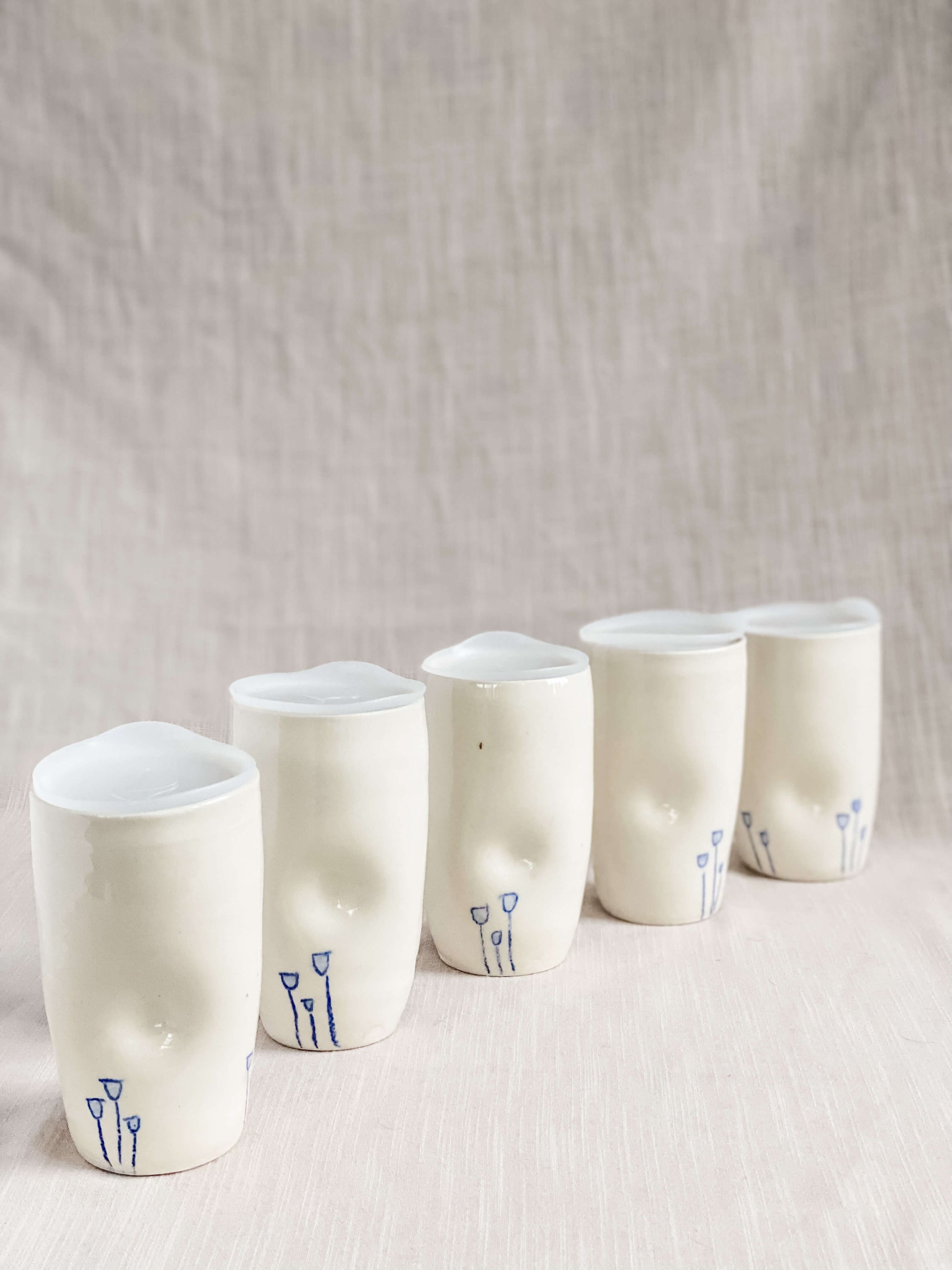 Tasses de voyage tulipes en porcelaine blanche