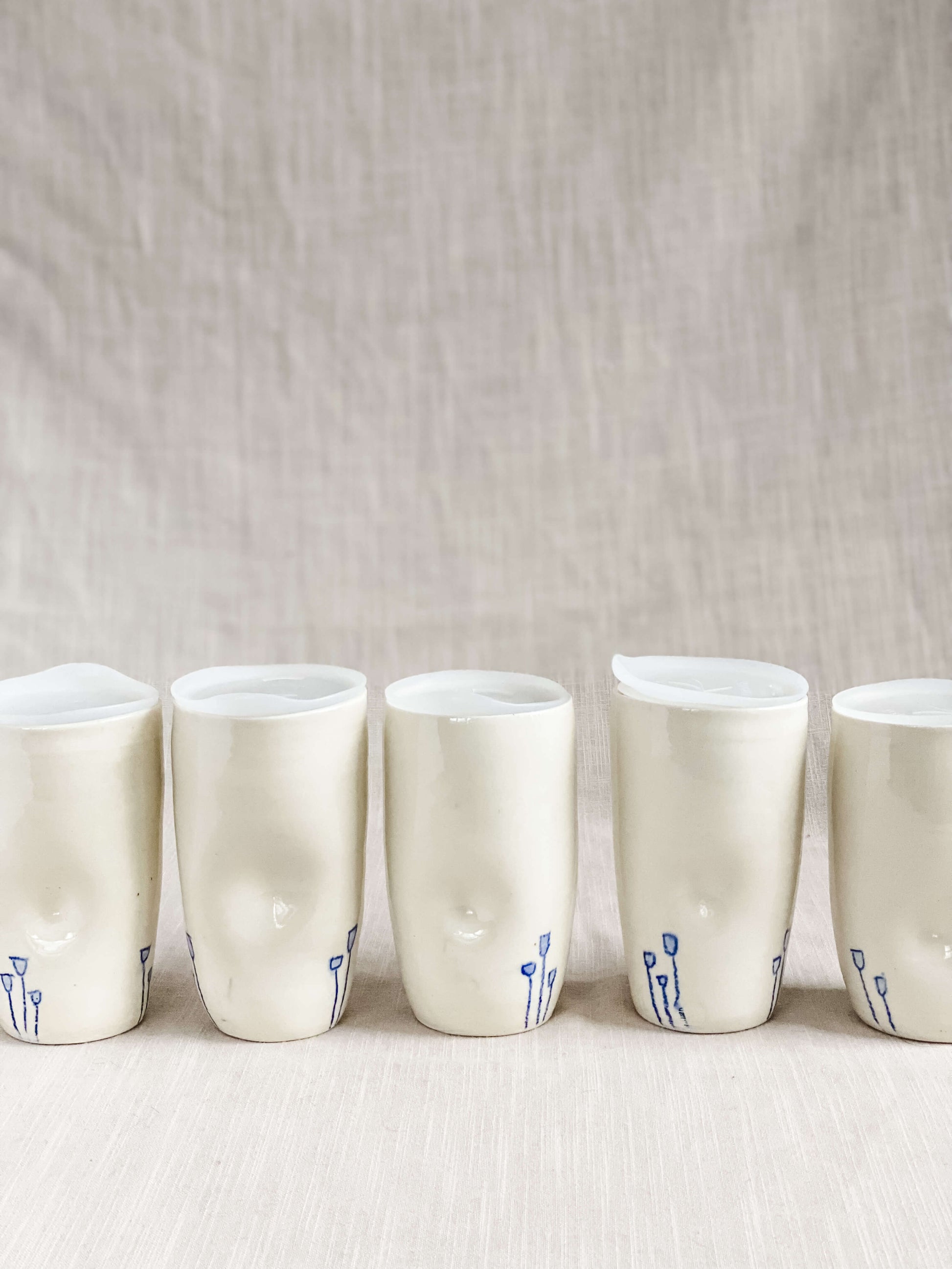 Tasses de voyage tulipes en porcelaine blanche