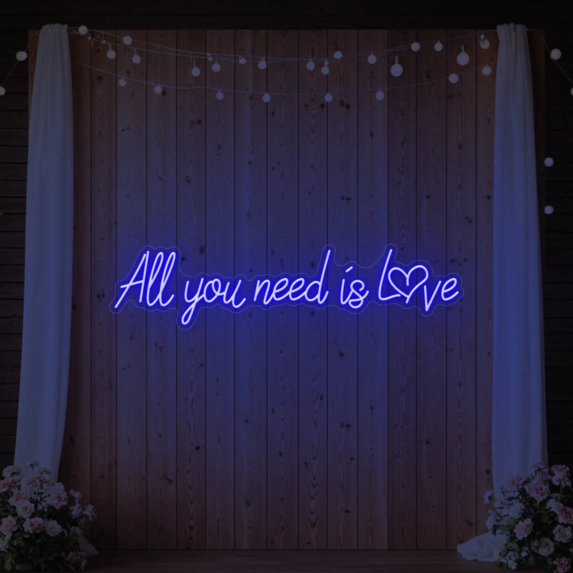 Tout ce dont vous avez besoin, c'est d'amour (enseigne lumineuse en forme de cœur)