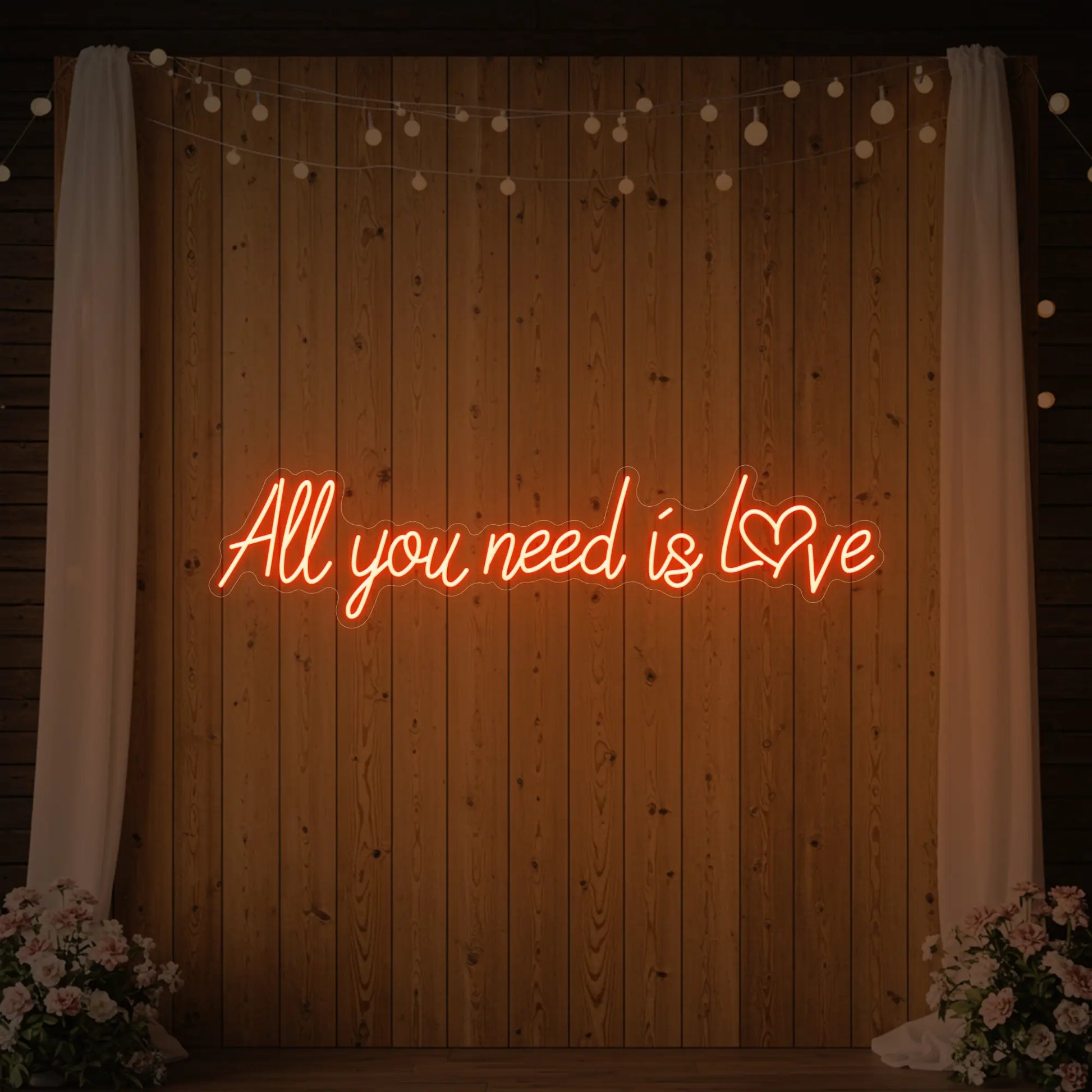 Tout ce dont vous avez besoin, c'est d'amour (enseigne lumineuse en forme de cœur)