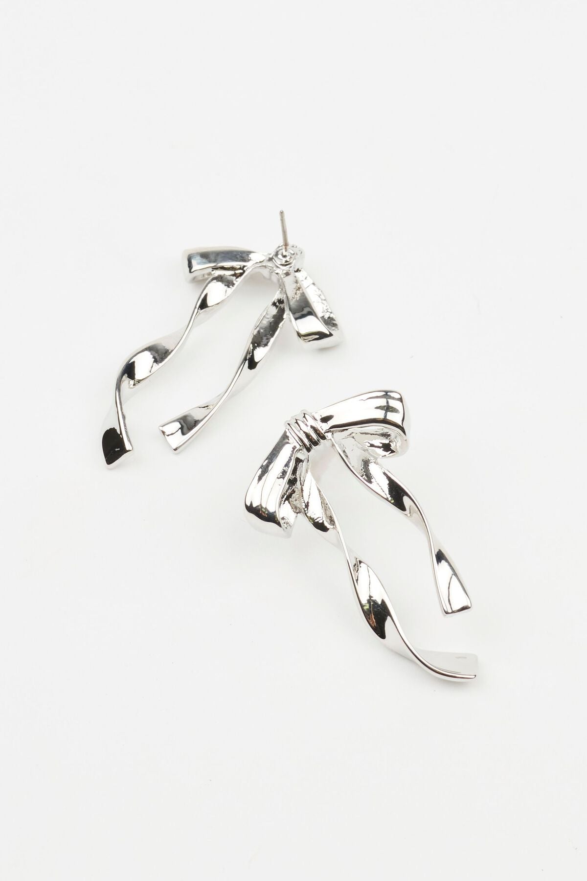 Boucles d'oreilles en métal avec nœud