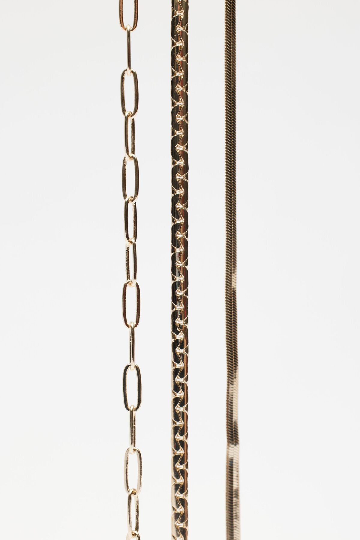 Collier à plusieurs niveaux avec trombone, serpent et chaîne plate
