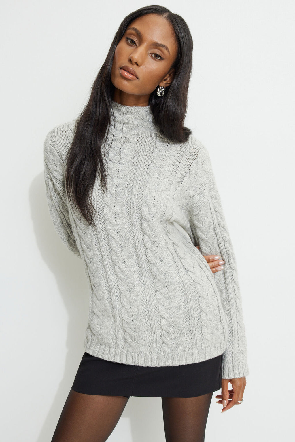 Pull à col montant en maille torsadée