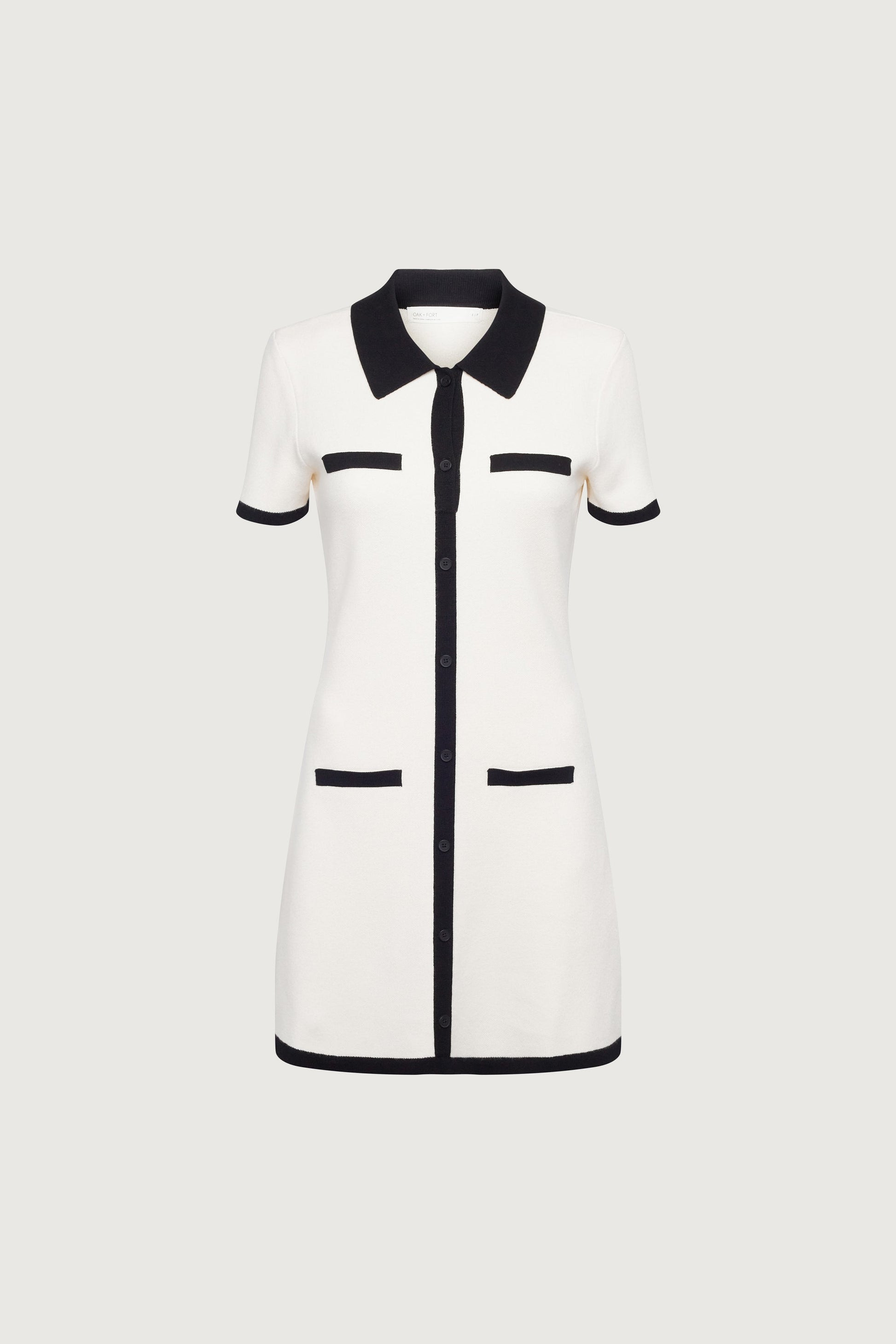 MINI-ROBE EN MAILLE À COL ET BORDURES CONTRASTÉES