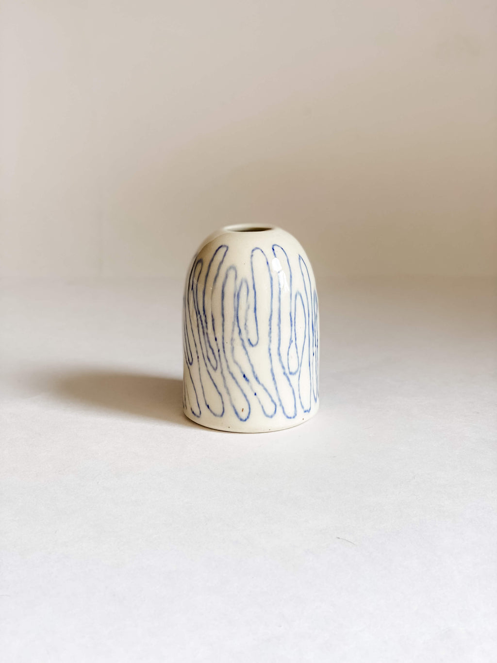 handmade pottery white porcelain bud vase hand drawn blue topographic style lines