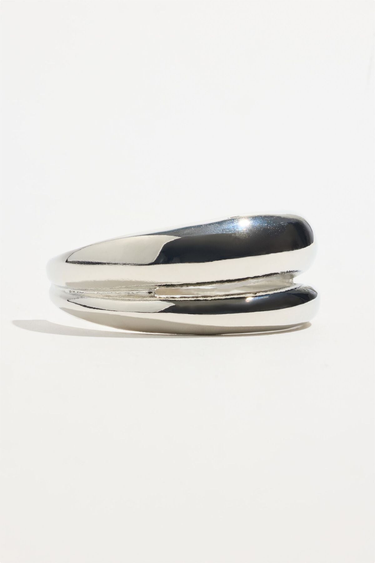 Bracelet manchette à double courbure
