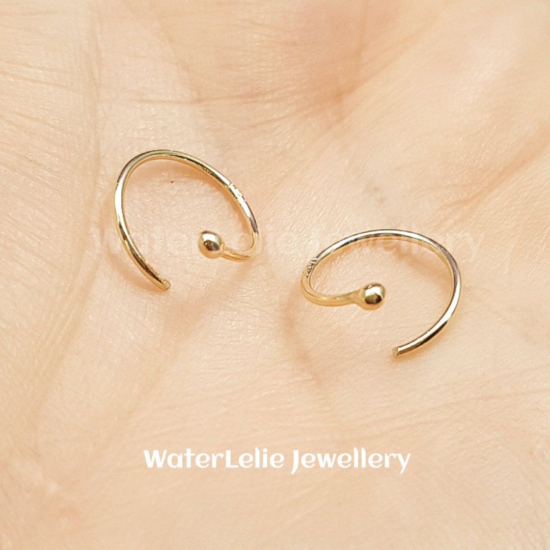 14k Gold Spiral Huggie Earrings: Solid Gold Hoops