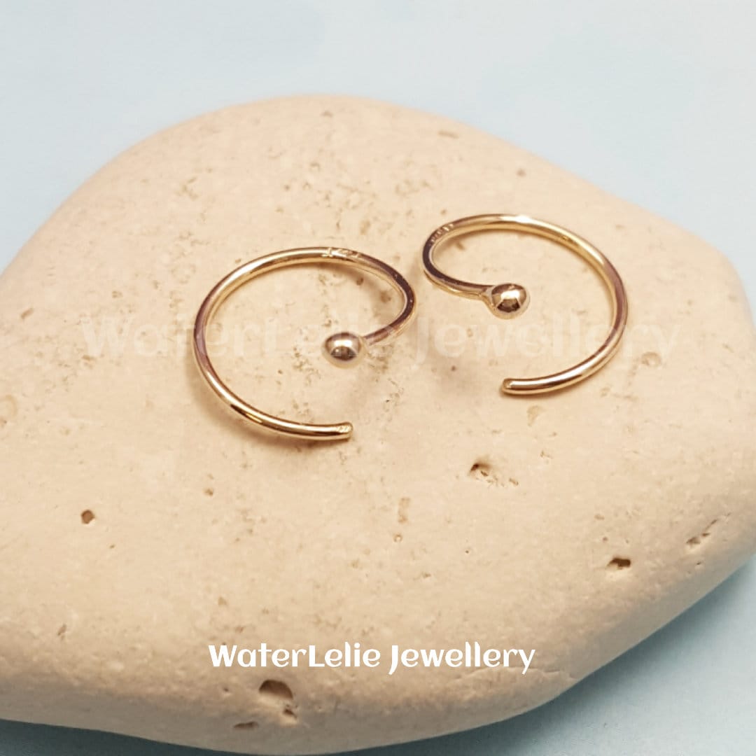 14k Gold Spiral Huggie Earrings: Solid Gold Hoops