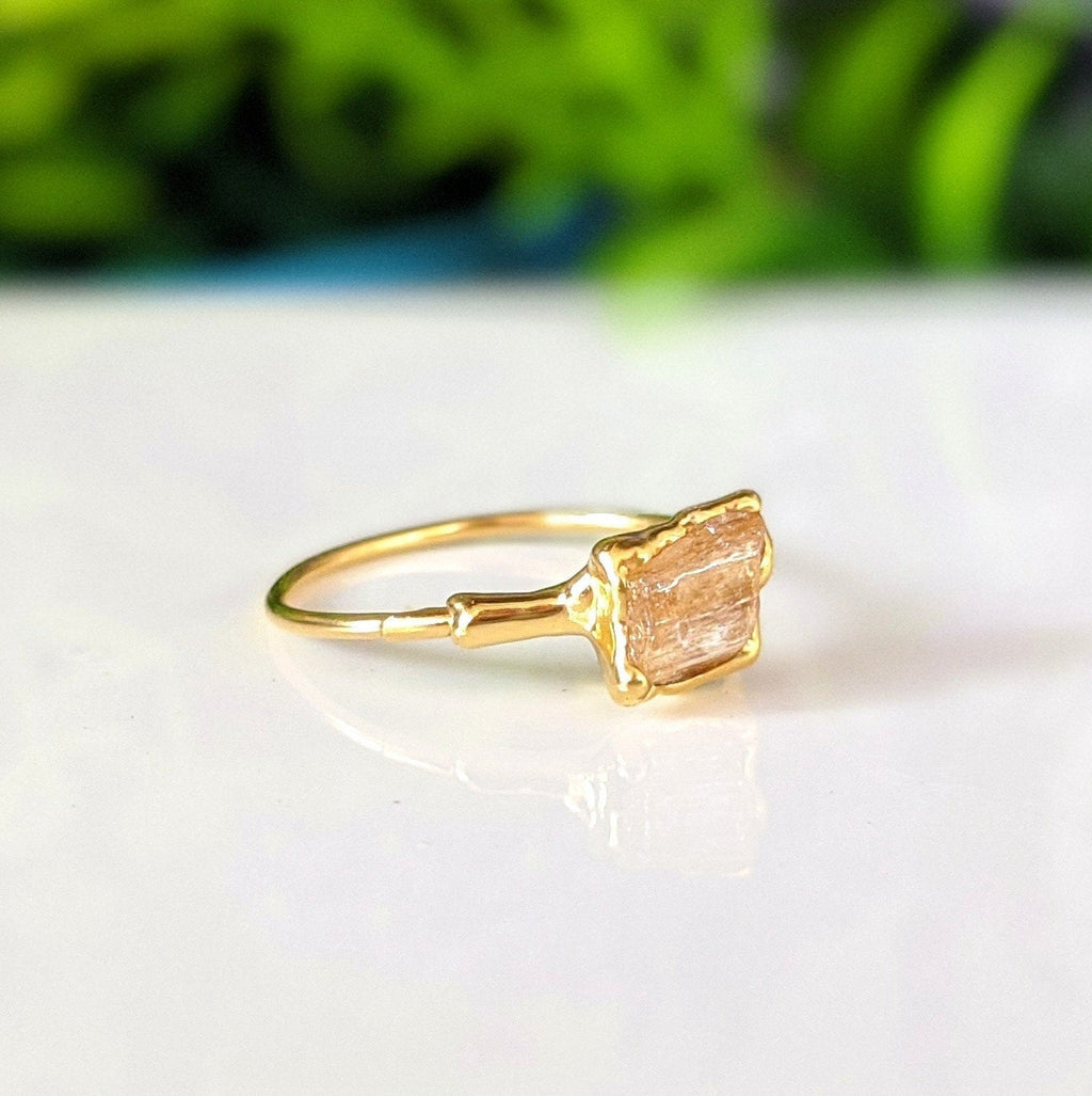 Bague en topaze impériale brute