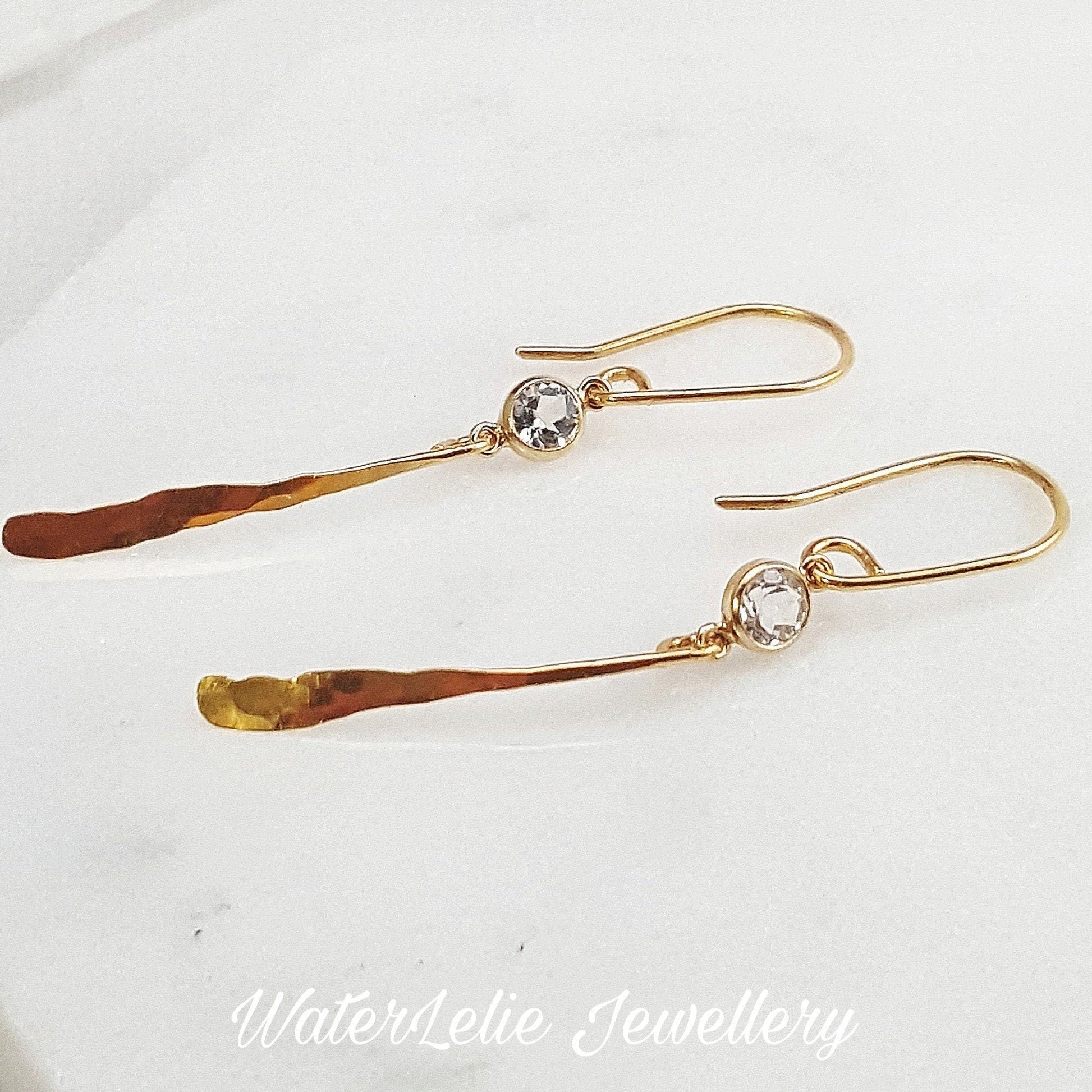 24k Gold Dangle Earrings: Hammered Artisan Jewelry with White Topaz