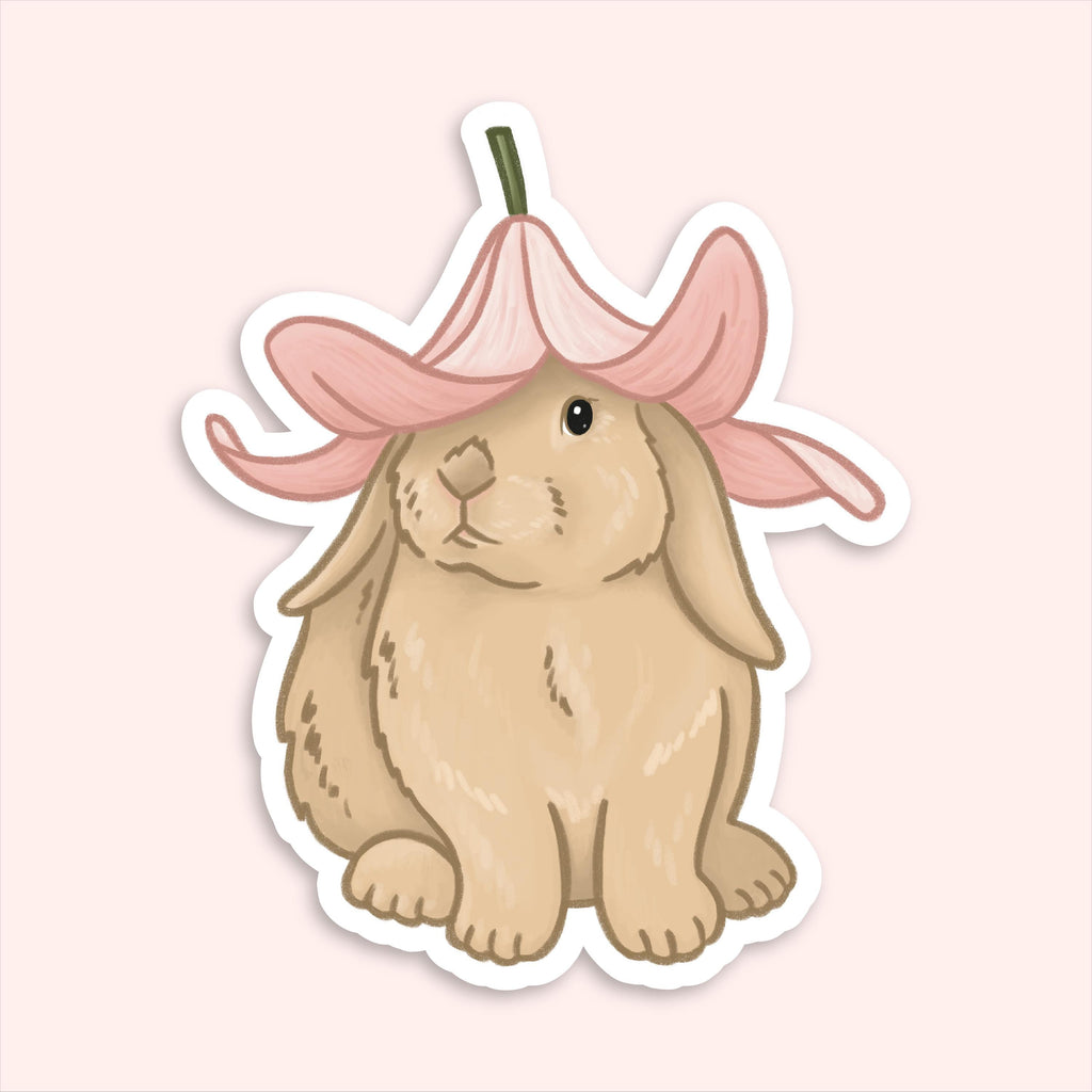 A sticker of an illustration of a bunny. The bunny is sitting facing forward with their head slightly turned to the side. They're wearing a pink flower hat.