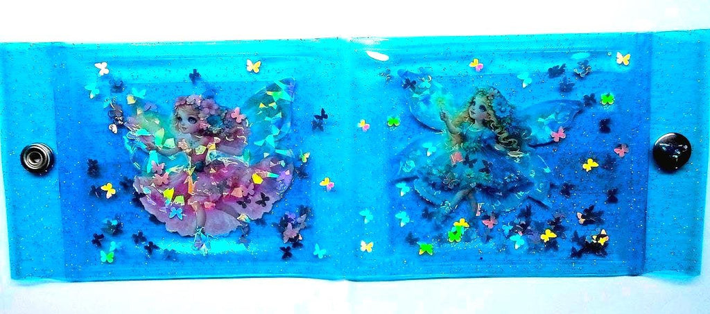 Liquid Glitter Jelly Elf Wallet. Multicoloured Flower Fairy + Holographic Butterfly Shimmer Float in Metallic Baby Blue Vinyl. LED Neon Case