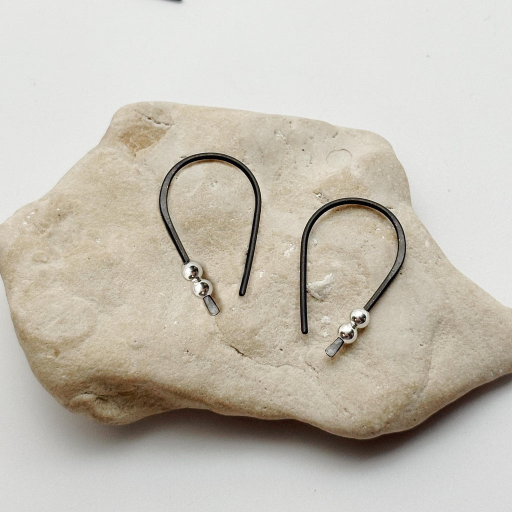Black Niobium hoop earrings. Small 3/4" hoops. Silver accent beads. Hypoallergenic