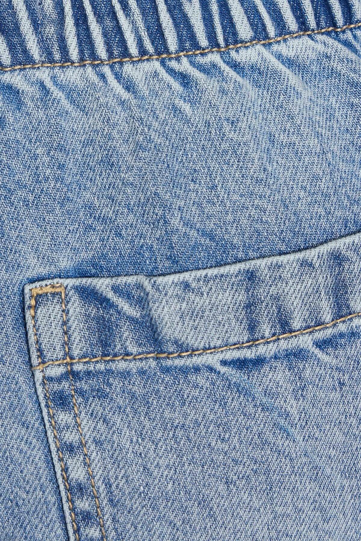 Jean large taille basse avec ceinture