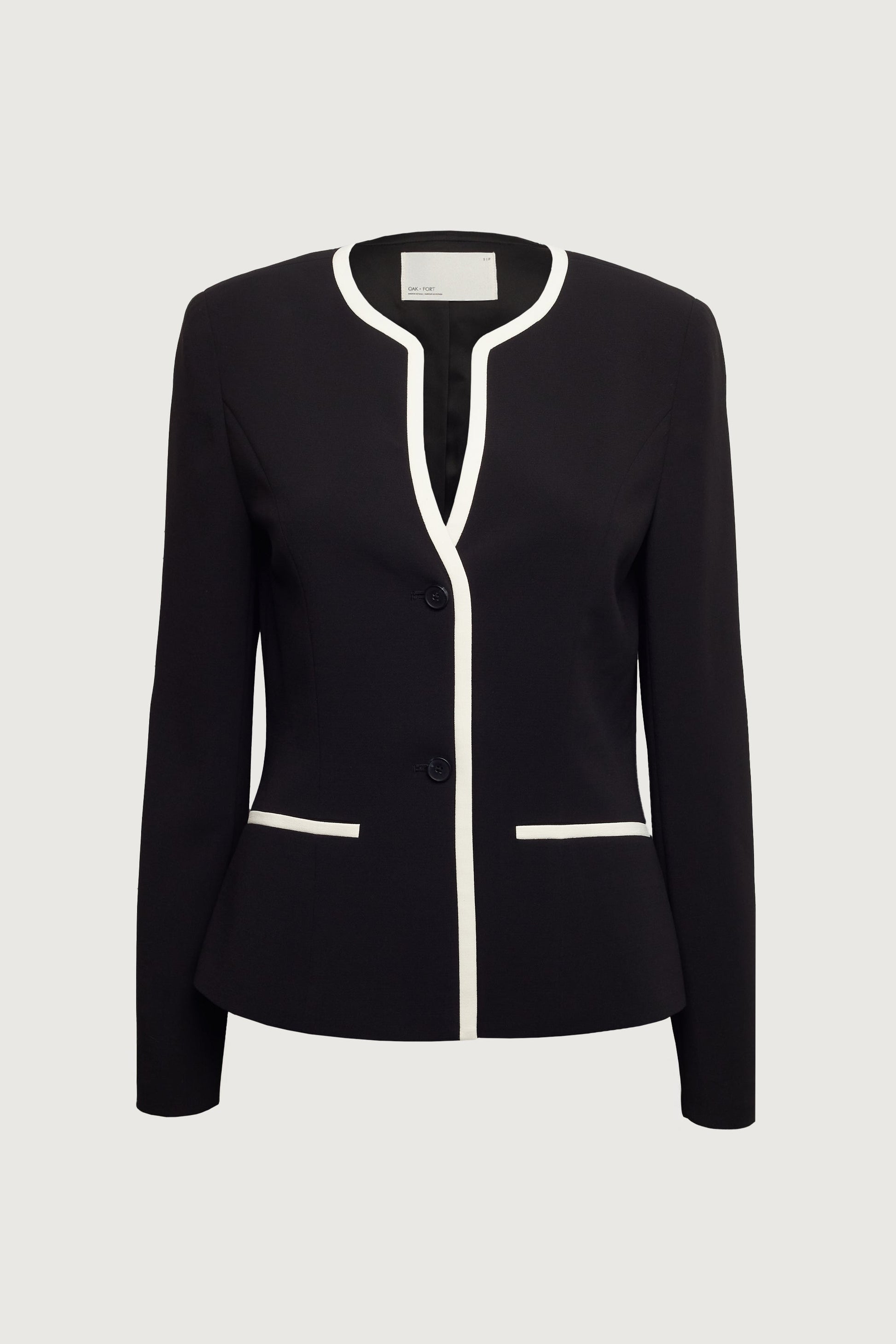 Blazer sans col à boutons sur le devant et bordure contrastante