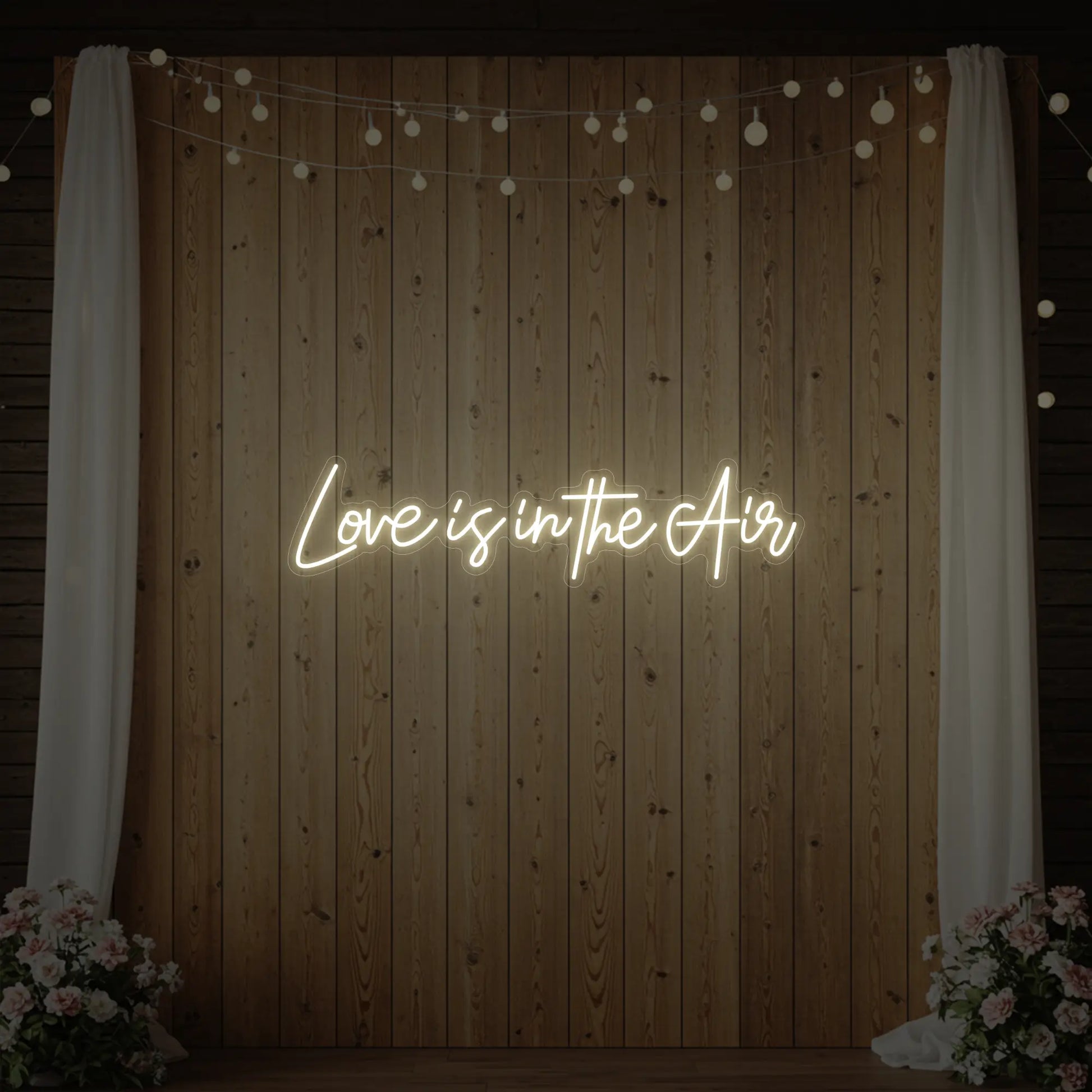 Enseigne lumineuse « L'amour est dans l'air »