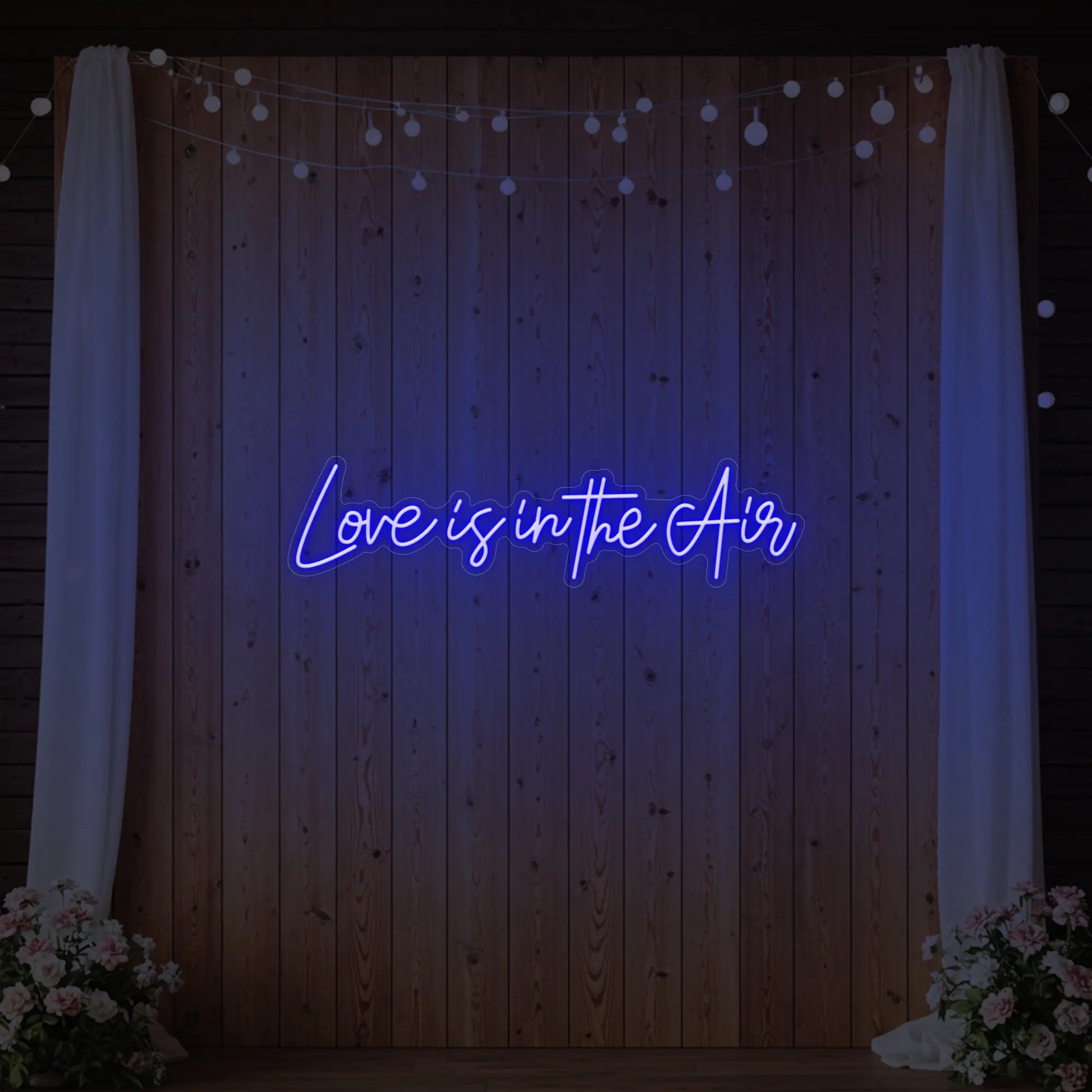 Enseigne lumineuse « L'amour est dans l'air »