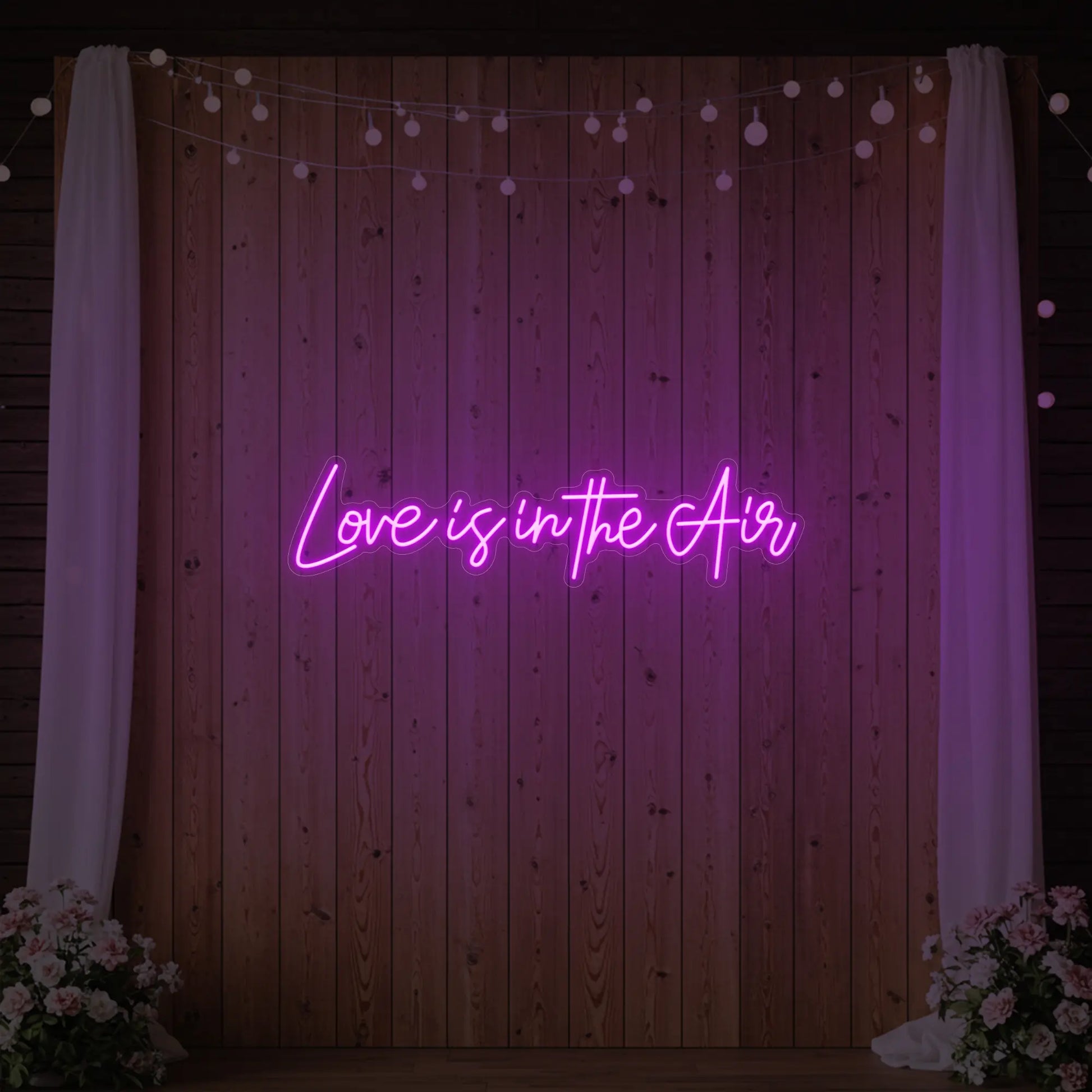 Enseigne lumineuse « L'amour est dans l'air »