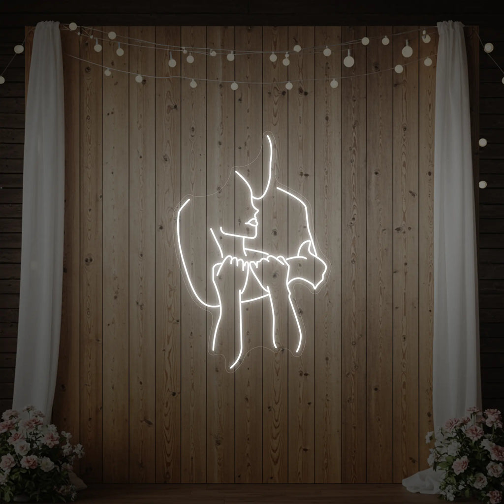 Enseigne lumineuse « Amoureux enlacés »