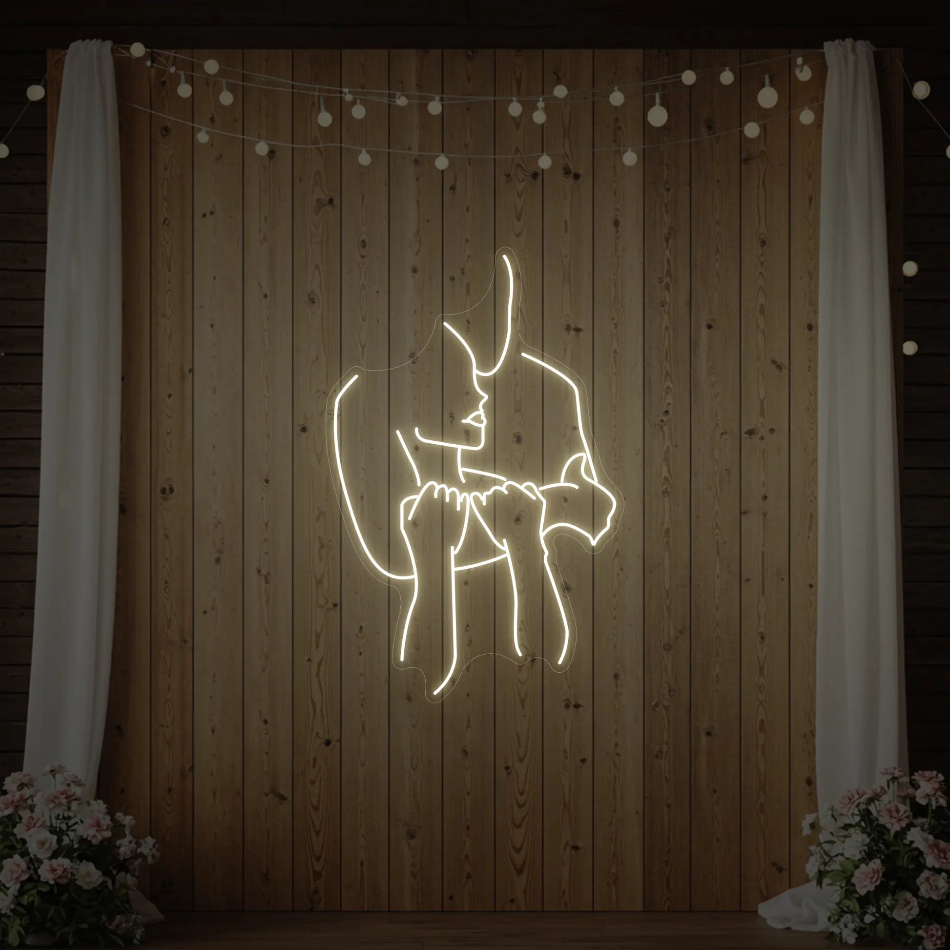 Enseigne lumineuse « Amoureux enlacés »