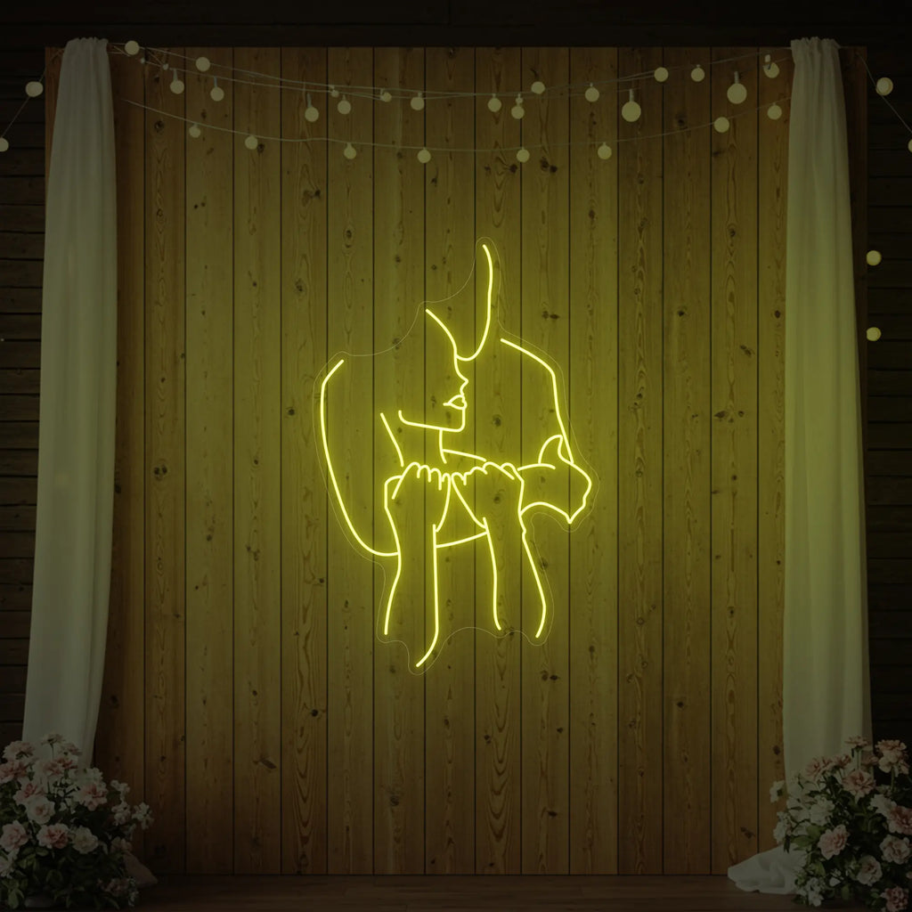 Enseigne lumineuse « Amoureux enlacés »