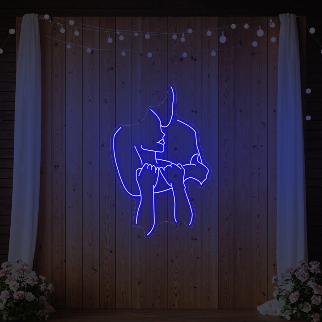 Enseigne lumineuse « Amoureux enlacés »