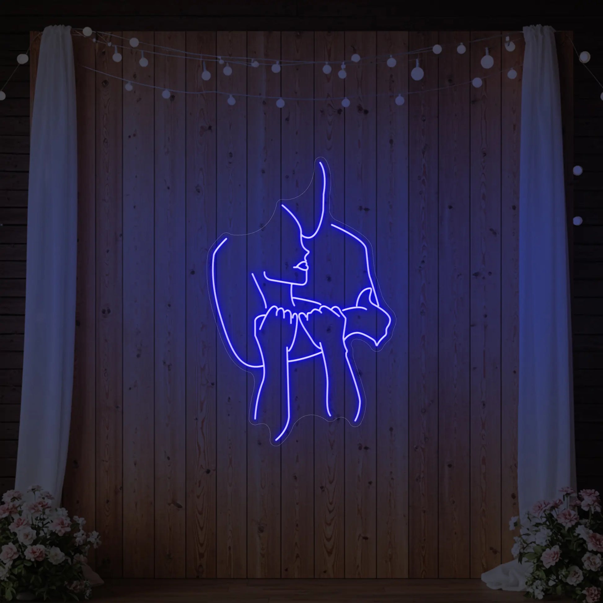Enseigne lumineuse « Amoureux enlacés »