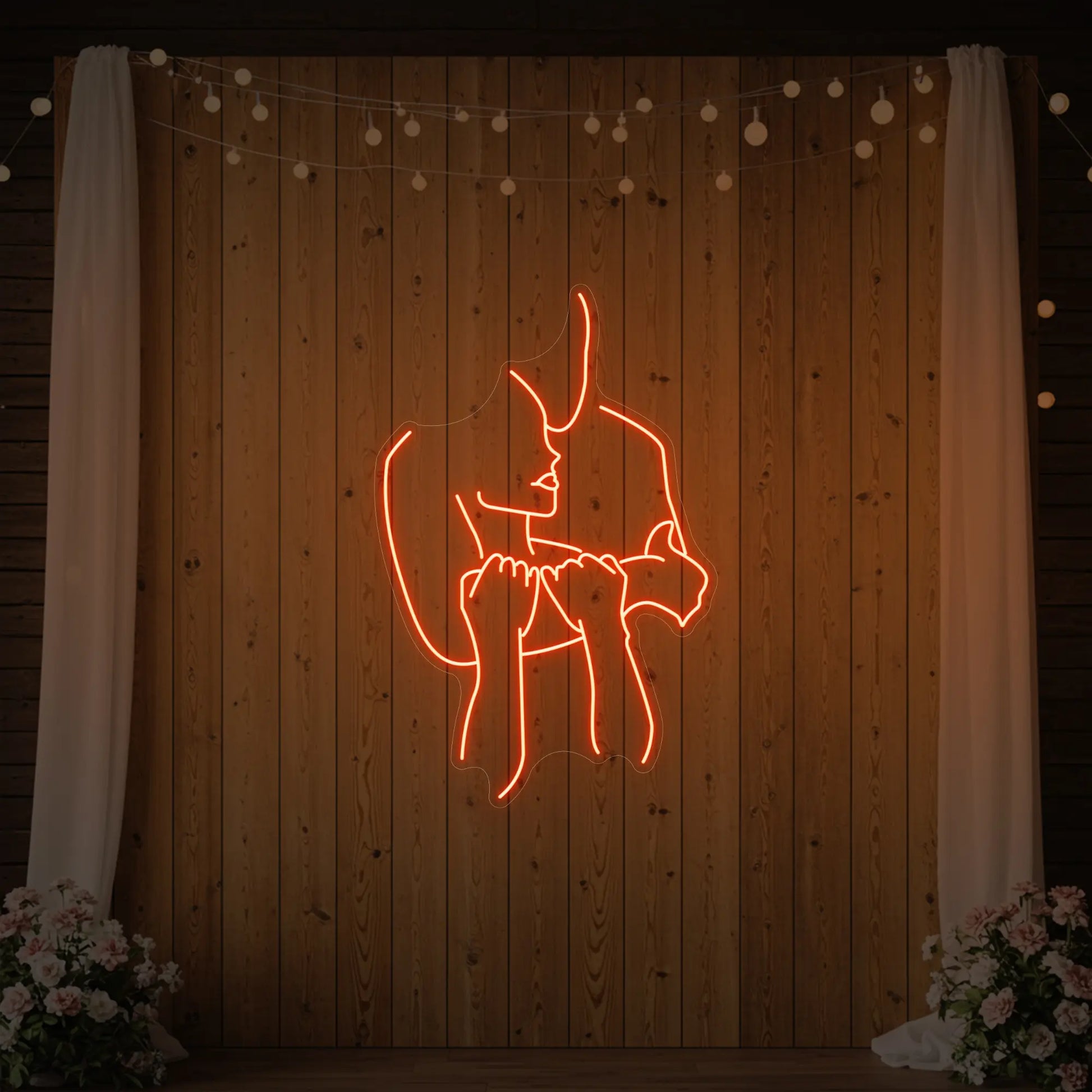 Enseigne lumineuse « Amoureux enlacés »