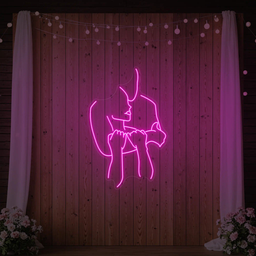 Enseigne lumineuse « Amoureux enlacés »