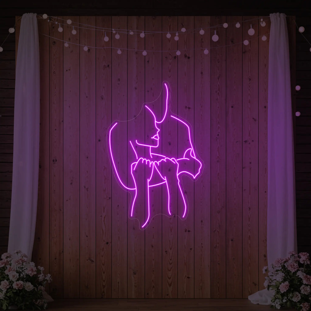 Enseigne lumineuse « Amoureux enlacés »