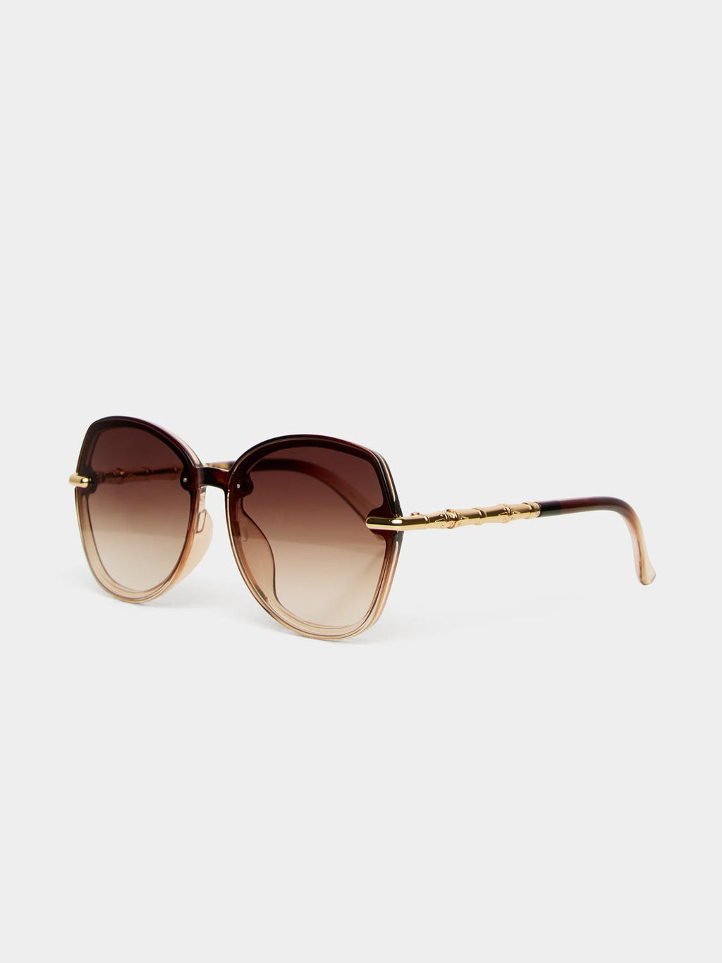 Lunettes de soleil rondes à monture transparente